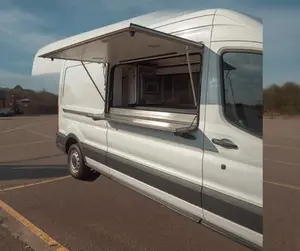 Mobile catering van with serving hatch ready for business