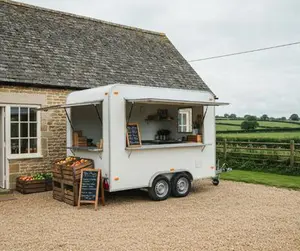 Mobile catering trailer parked outside a countryside farm shop in England