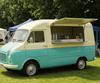 Teal vintage-style milkshake van at a UK summer event