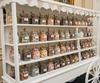 Sweet cart display with glass jars of pick and mix sweets