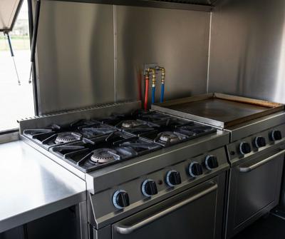 Commercial gas cooker in a UK catering trailer