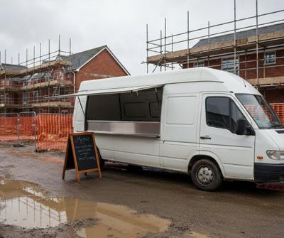 Mobile snack van parked at a UK building site
