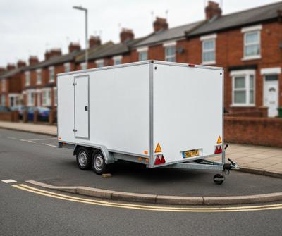 Mobile catering trailer parked on a UK residential street corner
