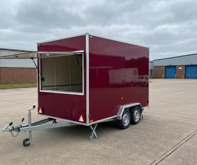 Mobile catering trailer parked on a UK industrial estate pitch